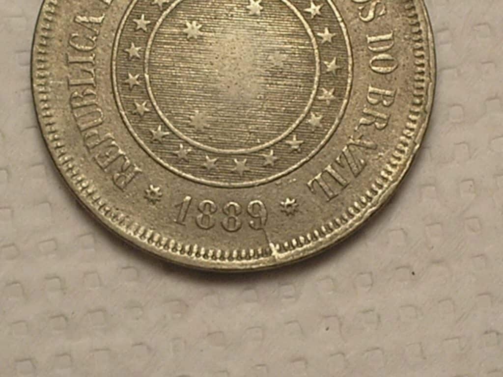 | Casa do Colecionador 100 Réis - 1889 / Variante: 9 com rabicho ligando a borda / Repúbllica / Mbs / Cod. 870.2