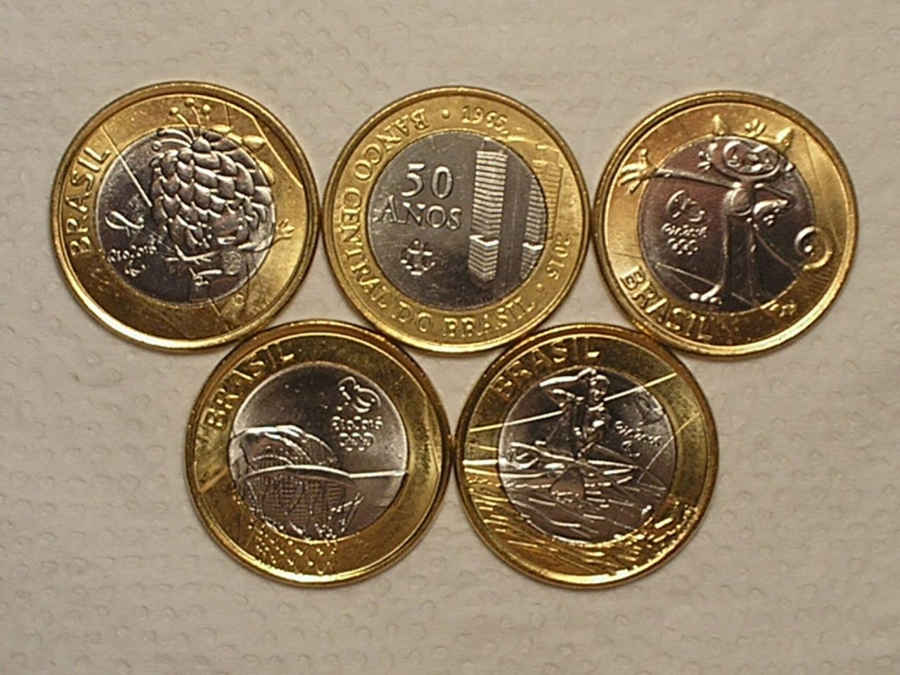 | Casa do Colecionador 5 Moedas Comemorativas das Olimpiadas 1 Real 2014/15 - Mascotes Gato e Cabeludo, Canoagem, Basquete e Bacen / Flor de Cunho / Cod. 170.6