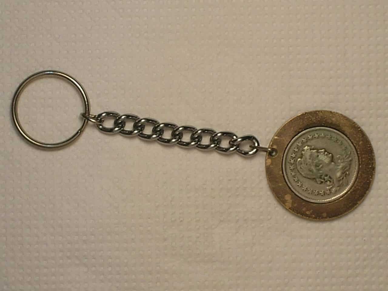 | Casa do Colecionador Chaveiro Moeda) 200 Réis - 1932 / República - cu/Ni / cod. 210