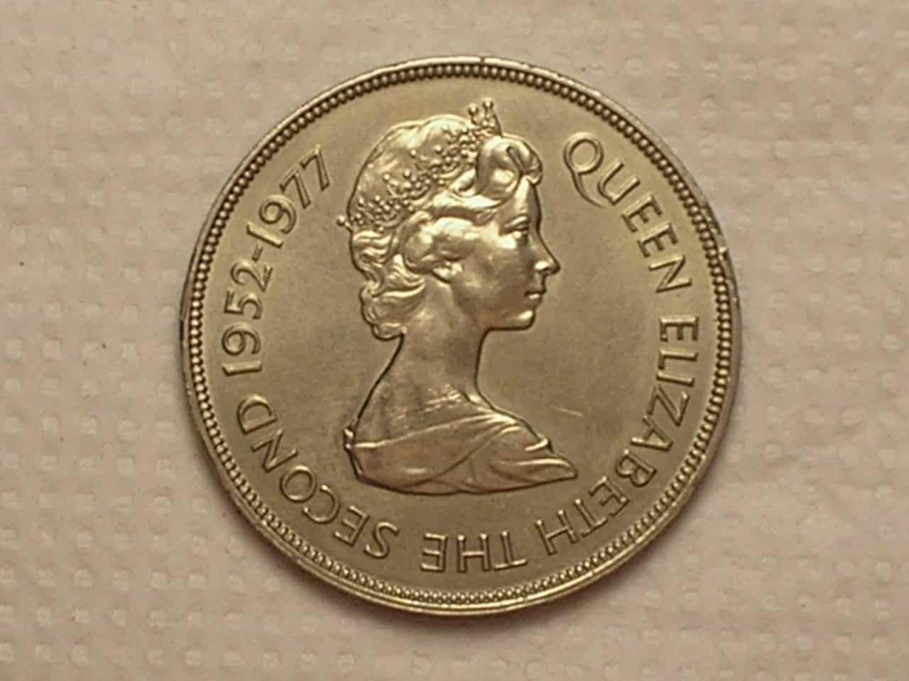 | Casa do Colecionador Jersey) 25 Pence - 1977 / Níquel / Flor de Cunho / Cod. 240
