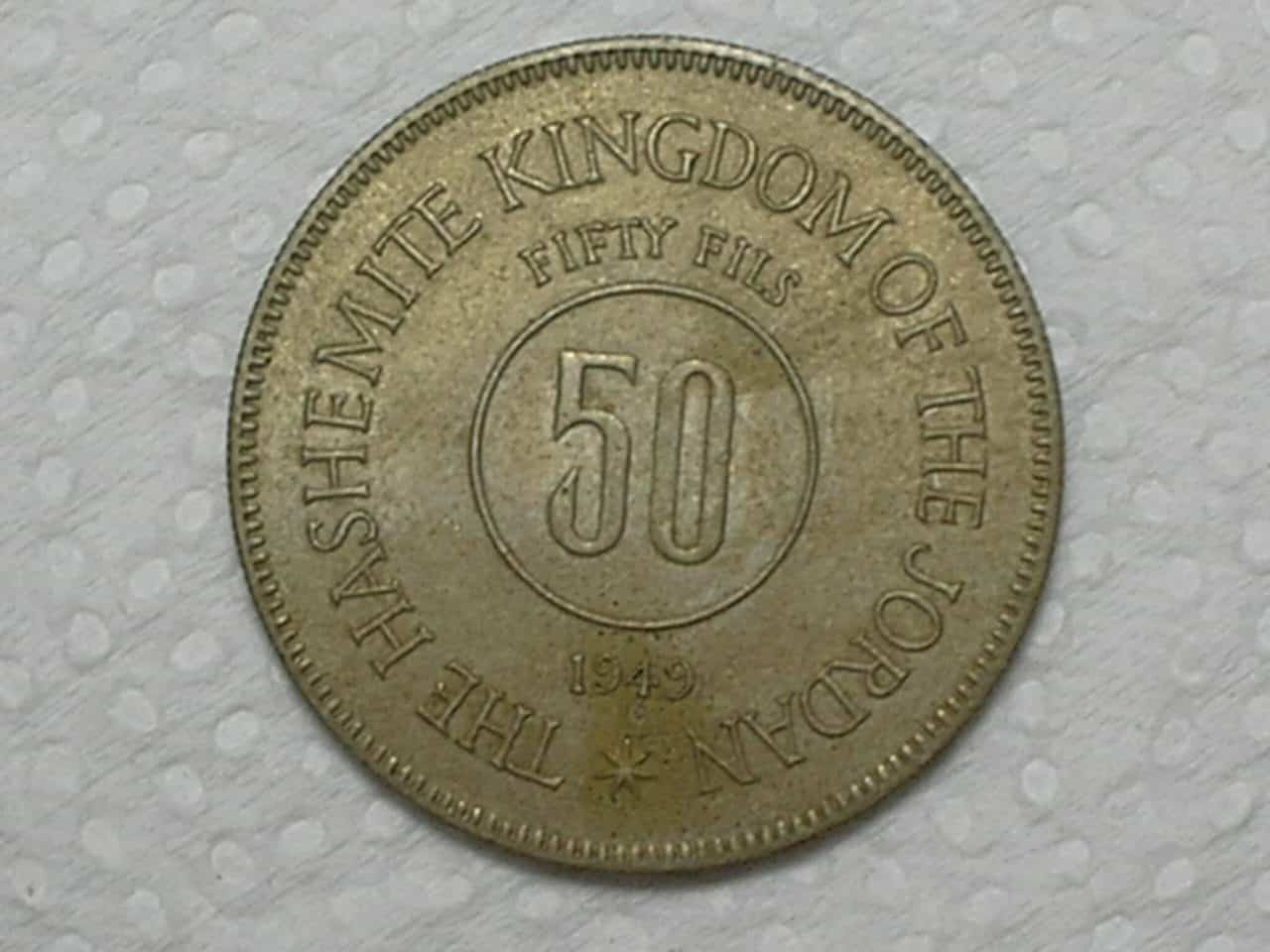 | Casa do Colecionador Jordania) 50 Fils - 1949 / Ni / Flor de Cunho / box5