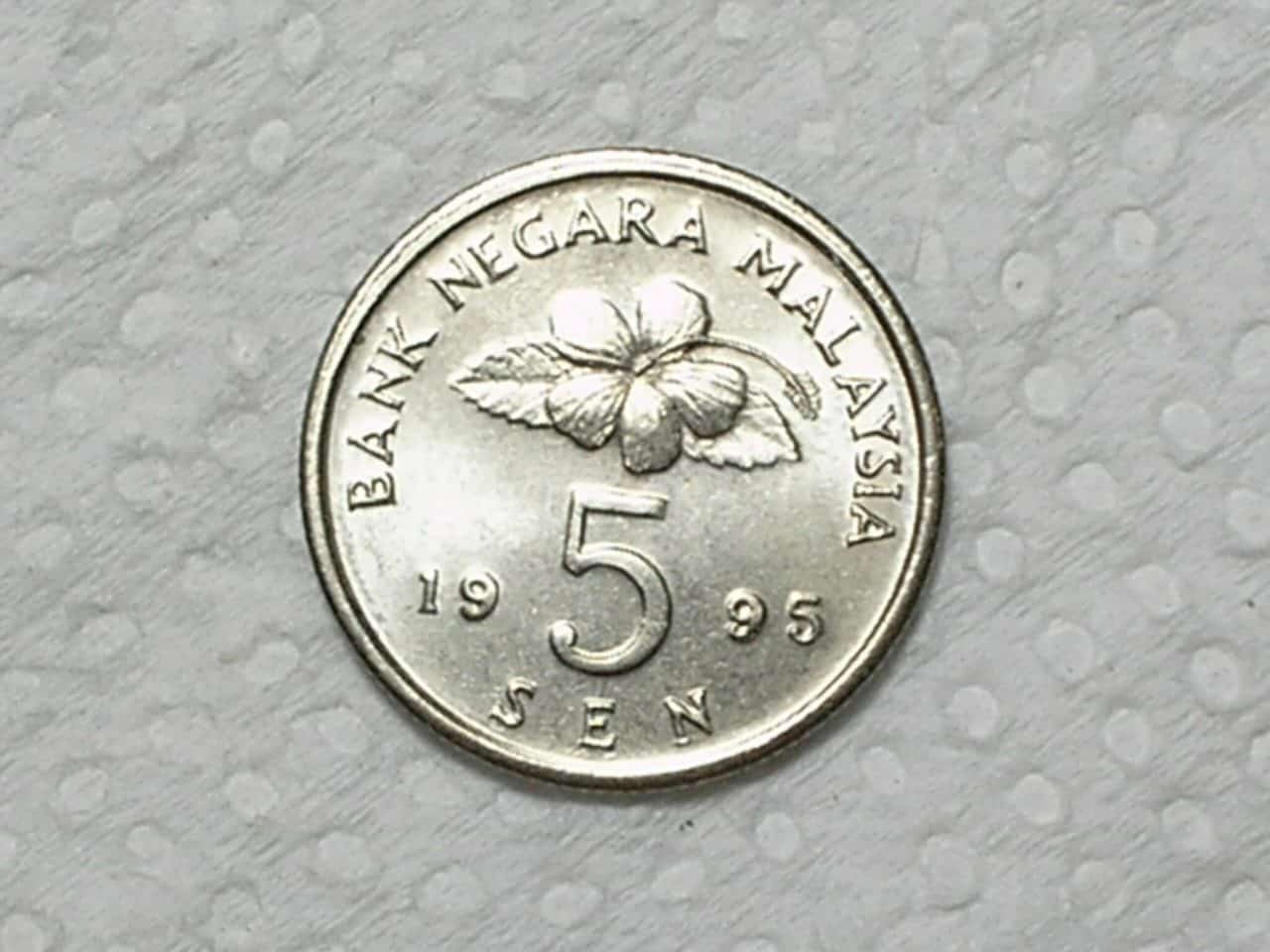 | Casa do Colecionador Malasia) 5 Sen - 1995 - Top With String / Ni / Flor de Cunho / box5