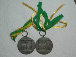 Duas medalhas Premial da Exposição de são Paulo - 1966 e 1967 com olhal e fita / Bronze prateado - 40 Gramas / Fc / cod. 850
