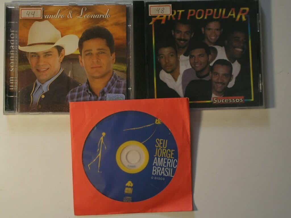 | Casa do Colecionador Coleção 3 CD's - Grandes Sucessos da época / Leando e Leonardo / Art Popular / Seu Jorge