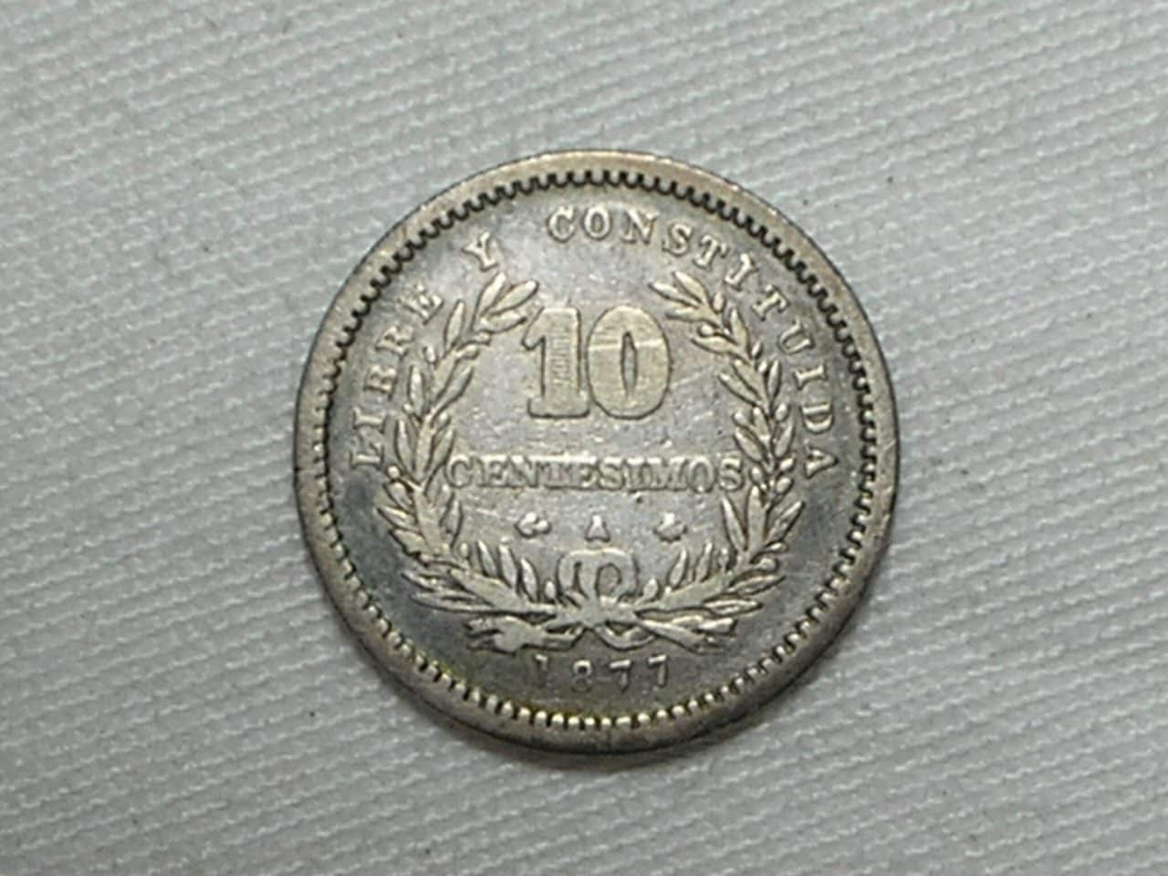| Casa do Colecionador Uruguai) 10 Centimos - 1877-a / Prata / Escassa / m30.2