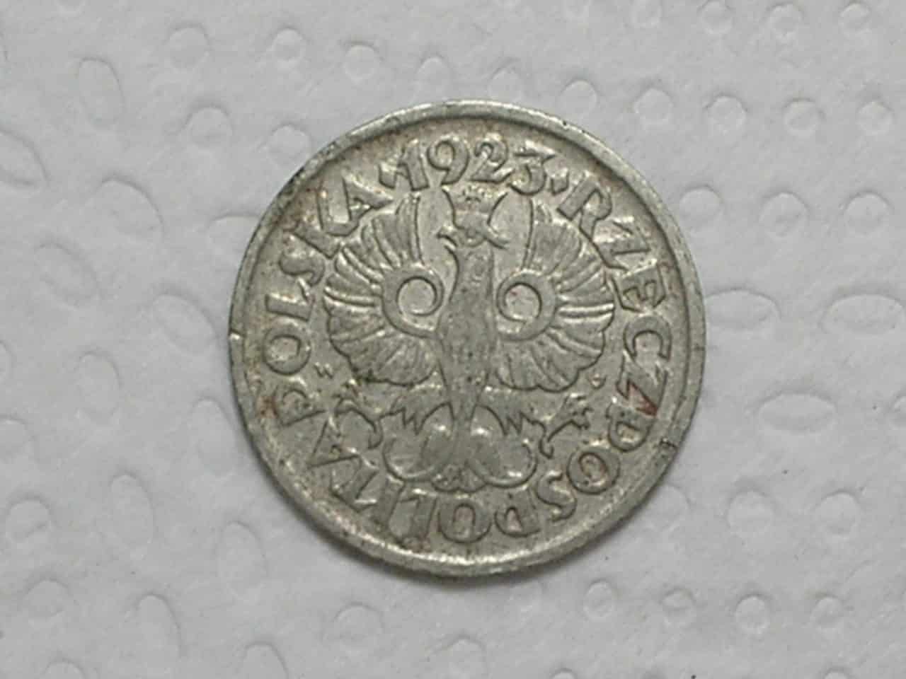 | Casa do Colecionador Polonia) 10 Groszy - 1923 / m140