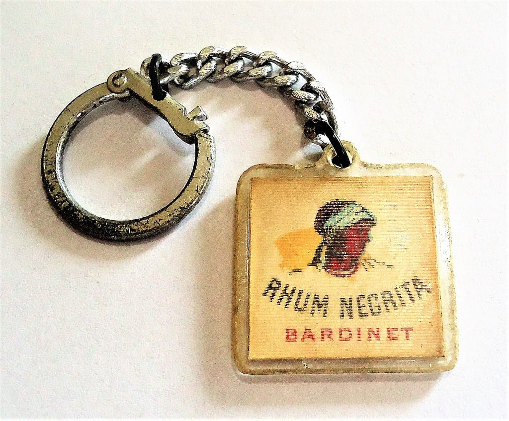 | Casa do Colecionador Chaveiro Antigo Holografico Rum Negrita - Martini - Anos 60