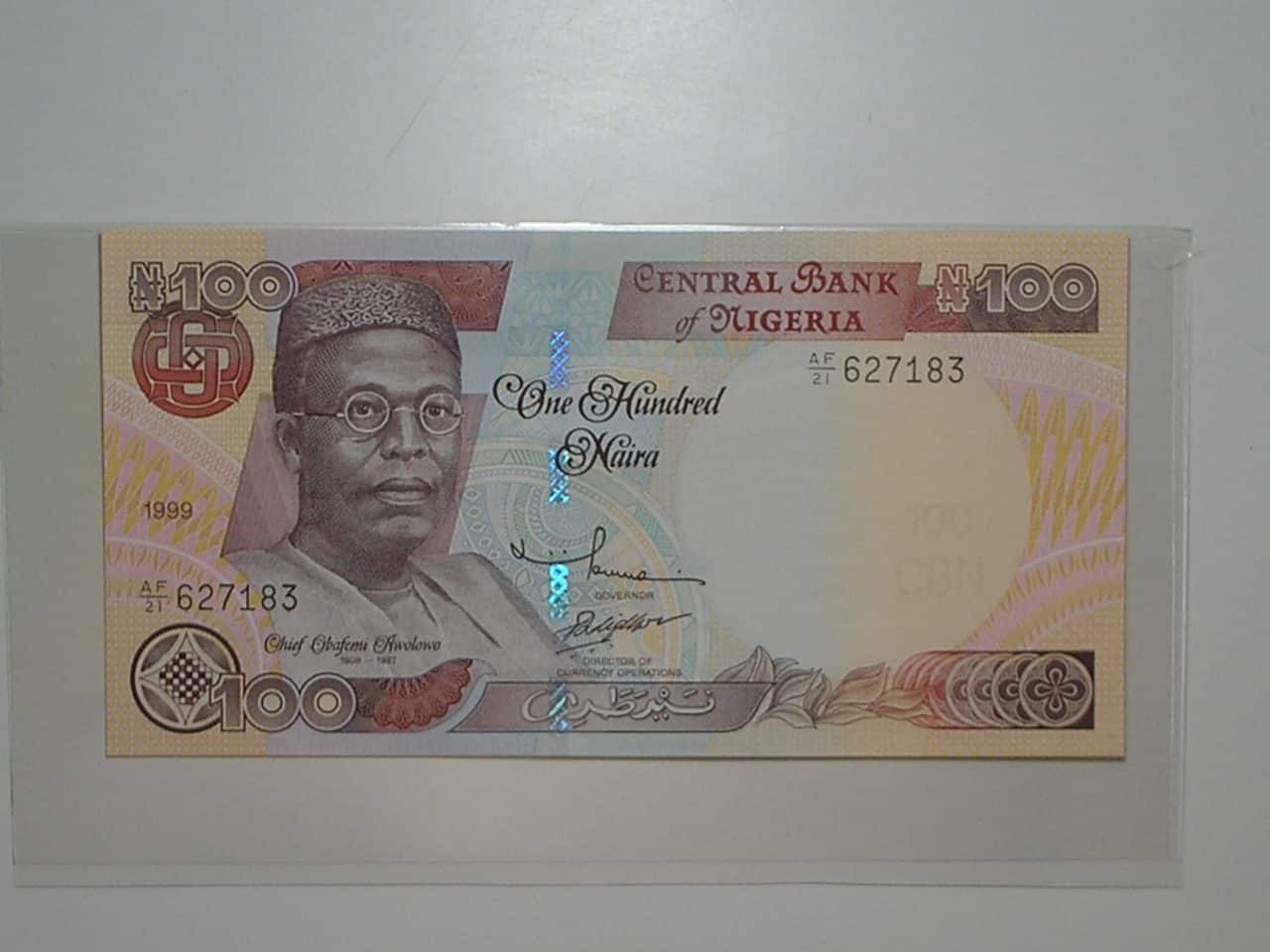 | Casa do Colecionador Nigeria) 100 Naira - 1999 / Flor de Estampa / ce04
