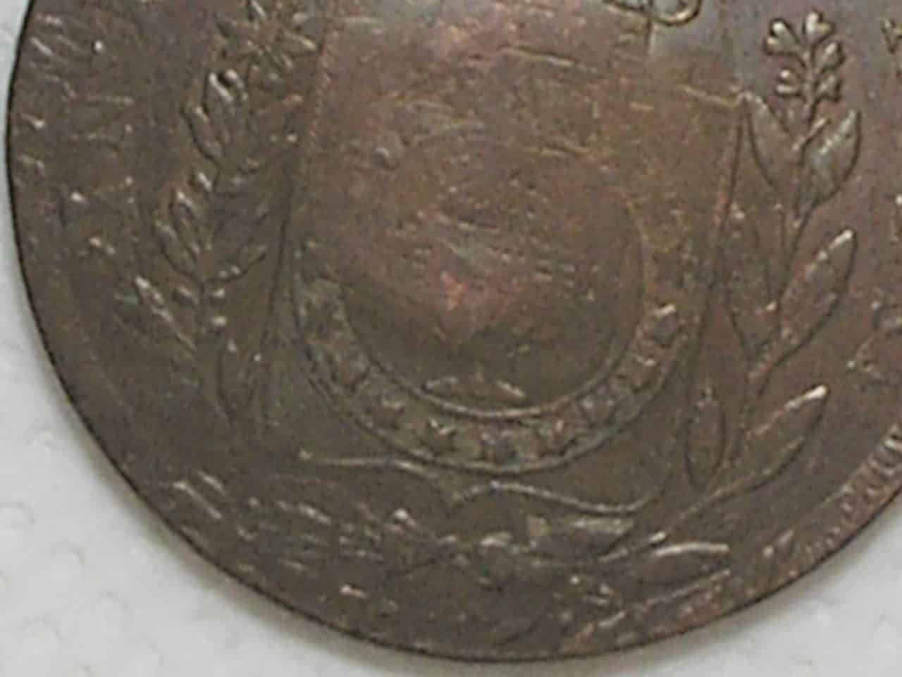 | Casa do Colecionador 80 Réis – 1832 - Rio / Recunhada sobre outro 80 Réis do Império / 20 tulipas / Carimbo 40/ Raro / Império D. Pedro I / Cobre / Mbc / box21