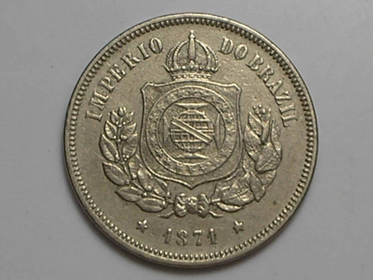 | Casa do Colecionador 100 Réis - 1871 / A primeira da série / Níquel do Império / Maravilhosa - Muito bonita - Inteira.. Temos outras no site / 05