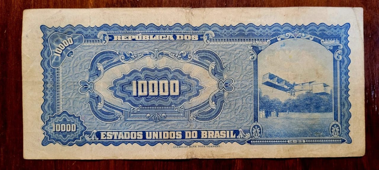 | Casa do Colecionador 10.000 (Dez Mil Cruzeiros) com Carimbo de 10 Cruzeiros Novos (Santos Dumont) - Cédula C124 - MBC - Nº 005395 (Ano 1966)
