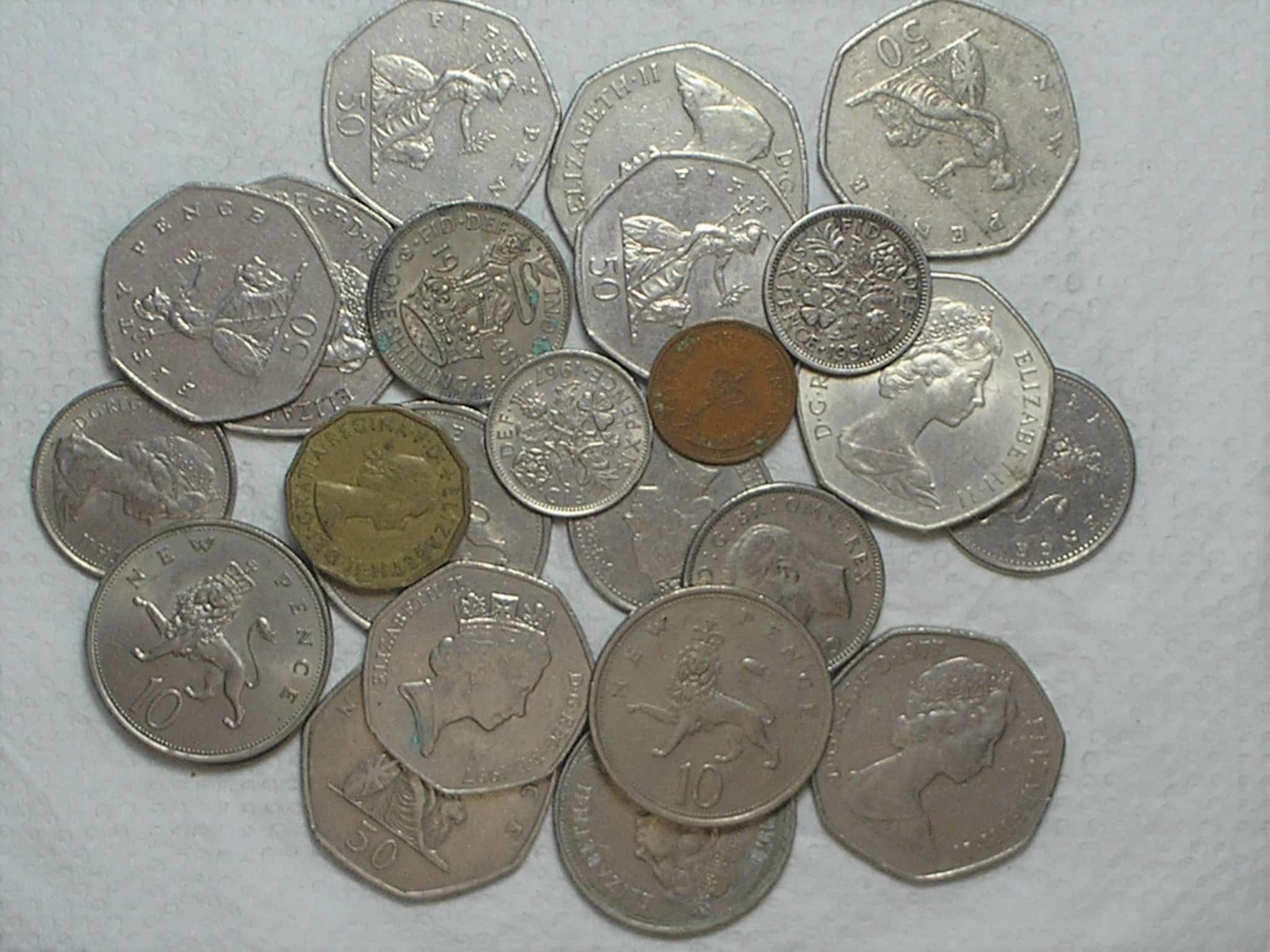 | Casa do Colecionador 24 moedas da Inglaterra diversas / m390