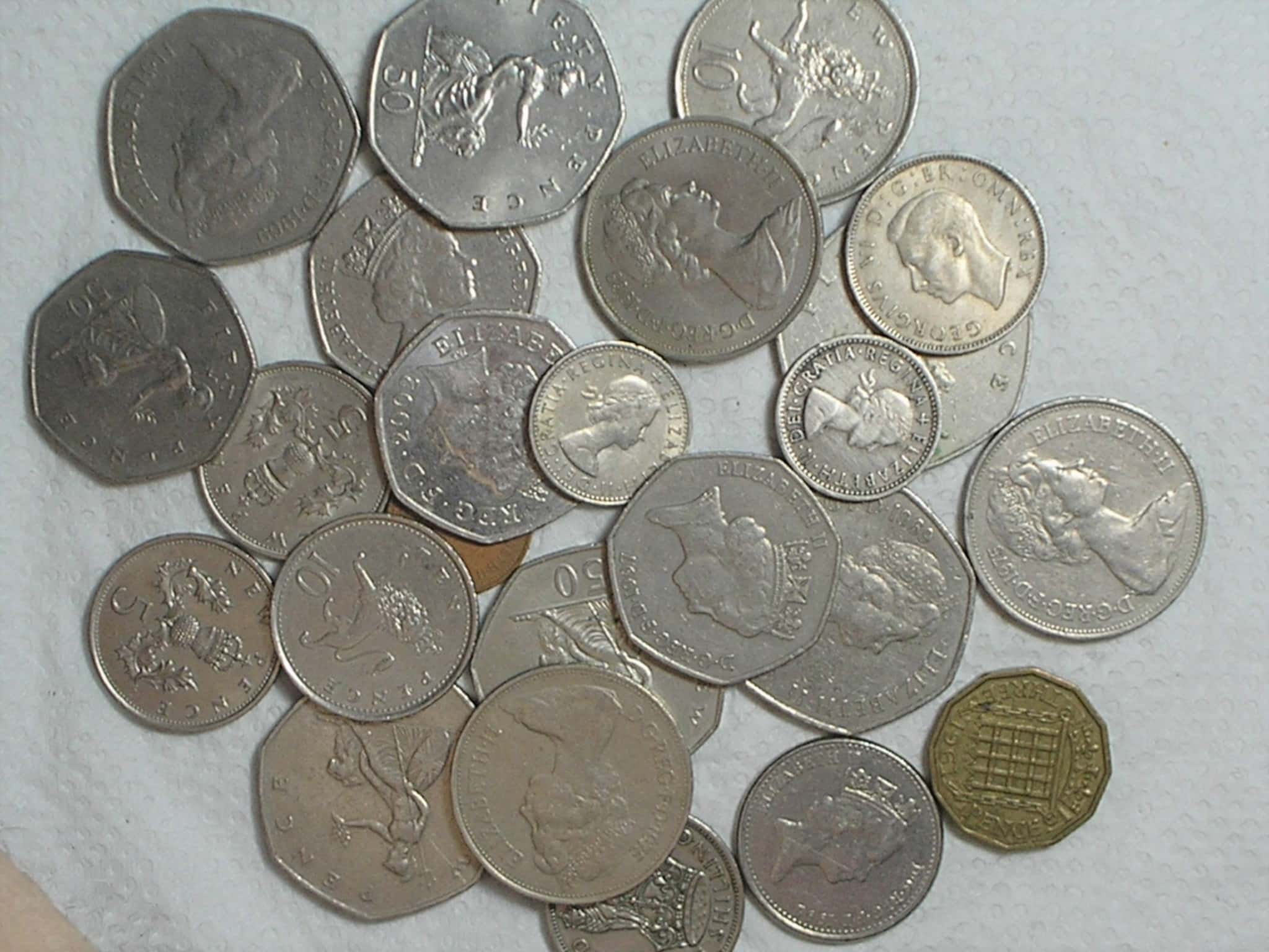 | Casa do Colecionador 24 moedas da Inglaterra diversas / m390