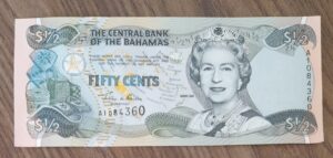 Cédula Bahamas 1/2 Dólar Rainha Flor de estampa