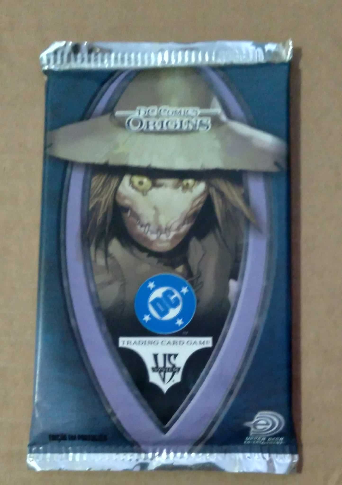 | Casa do Colecionador Booster Upper Deck DC Comics origins com 14 cartas.