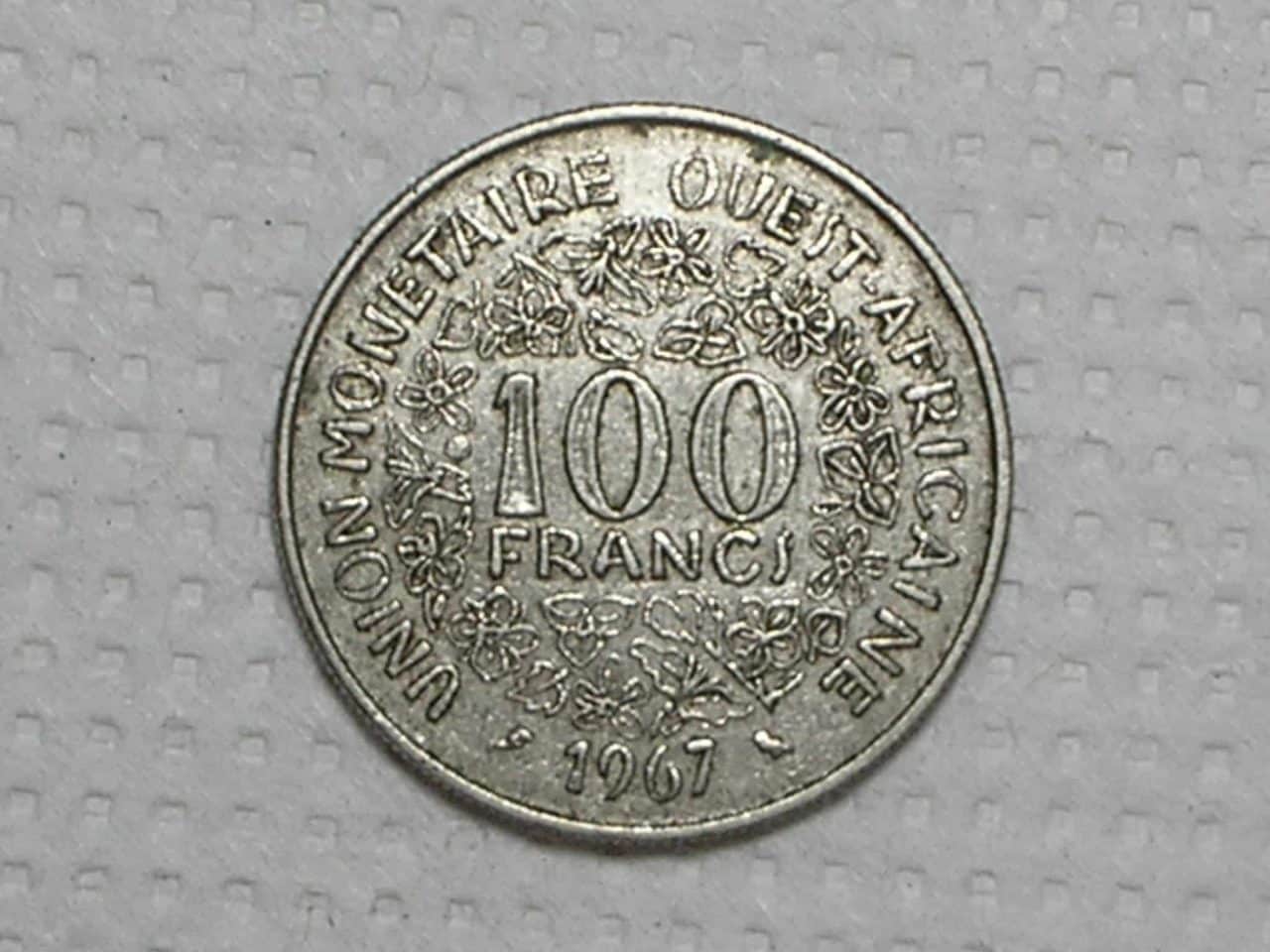 | Casa do Colecionador Africa, West States) 100 Francs - 1967 / Co/Ni / box39