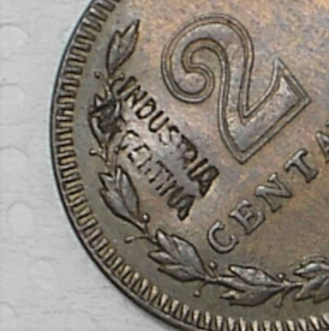 | Casa do Colecionador Argentina) 2 Centavos - 1946 com carimbo industria Argentina / Marcada com furo / Carimbo Piratini / Bronze / box32