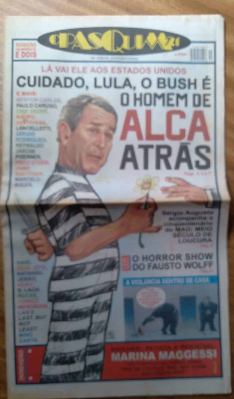 | Casa do Colecionador Jornal O Pasquim 21 042. Bush é o homem de Alca atrás.