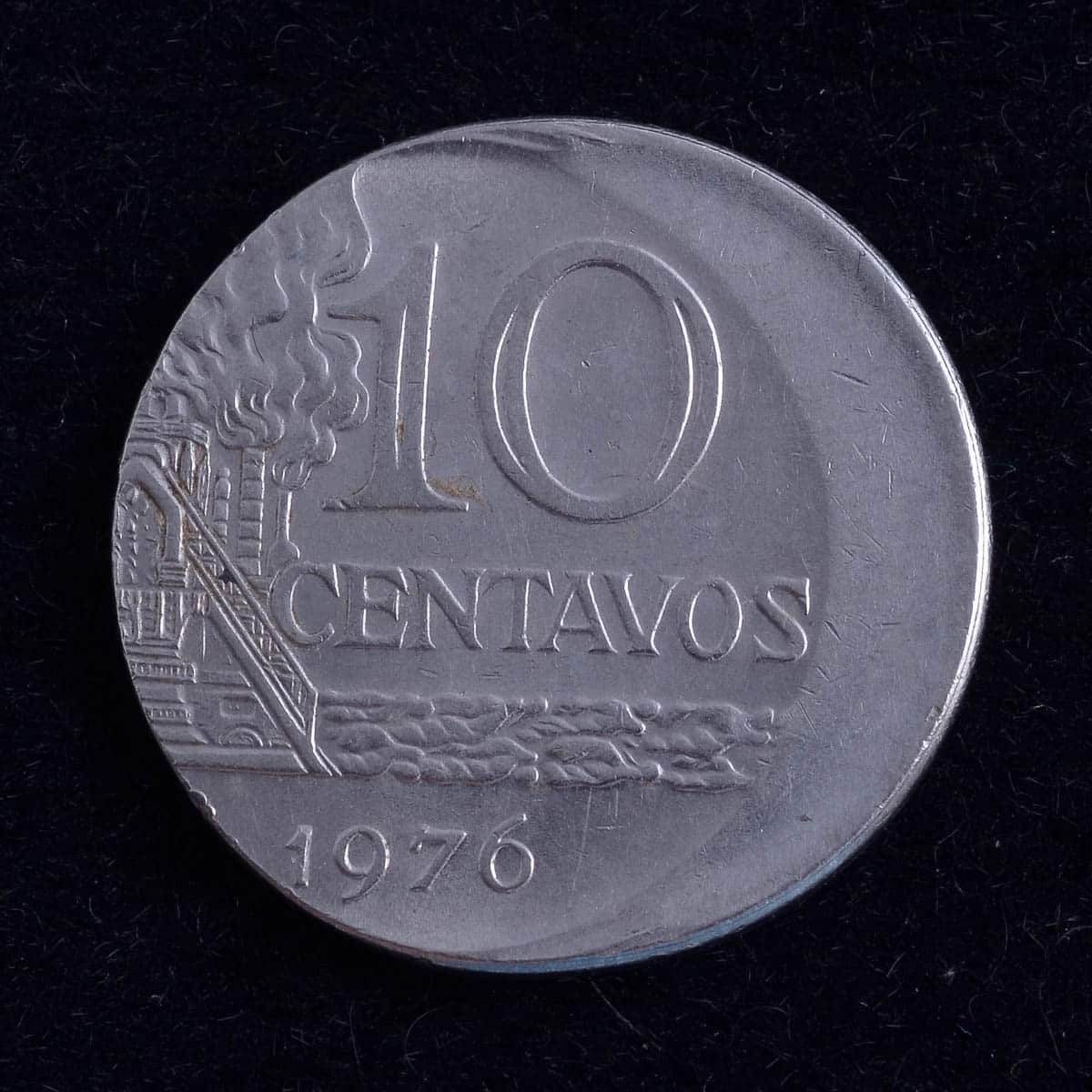 - 10 Centavos 1976 boné com defeito de cunho / Aço Inox / Estado de conservação Soberba