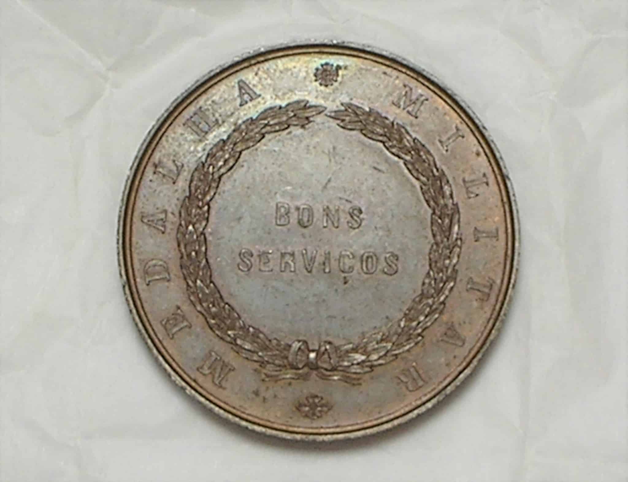 | Casa do Colecionador :Medalha de Don Luiz Rei de Porugal, concedida a ele em 1863 por bons serviços Militares / 3,5 cm em bronze / Flor de cunho / Peça Rara