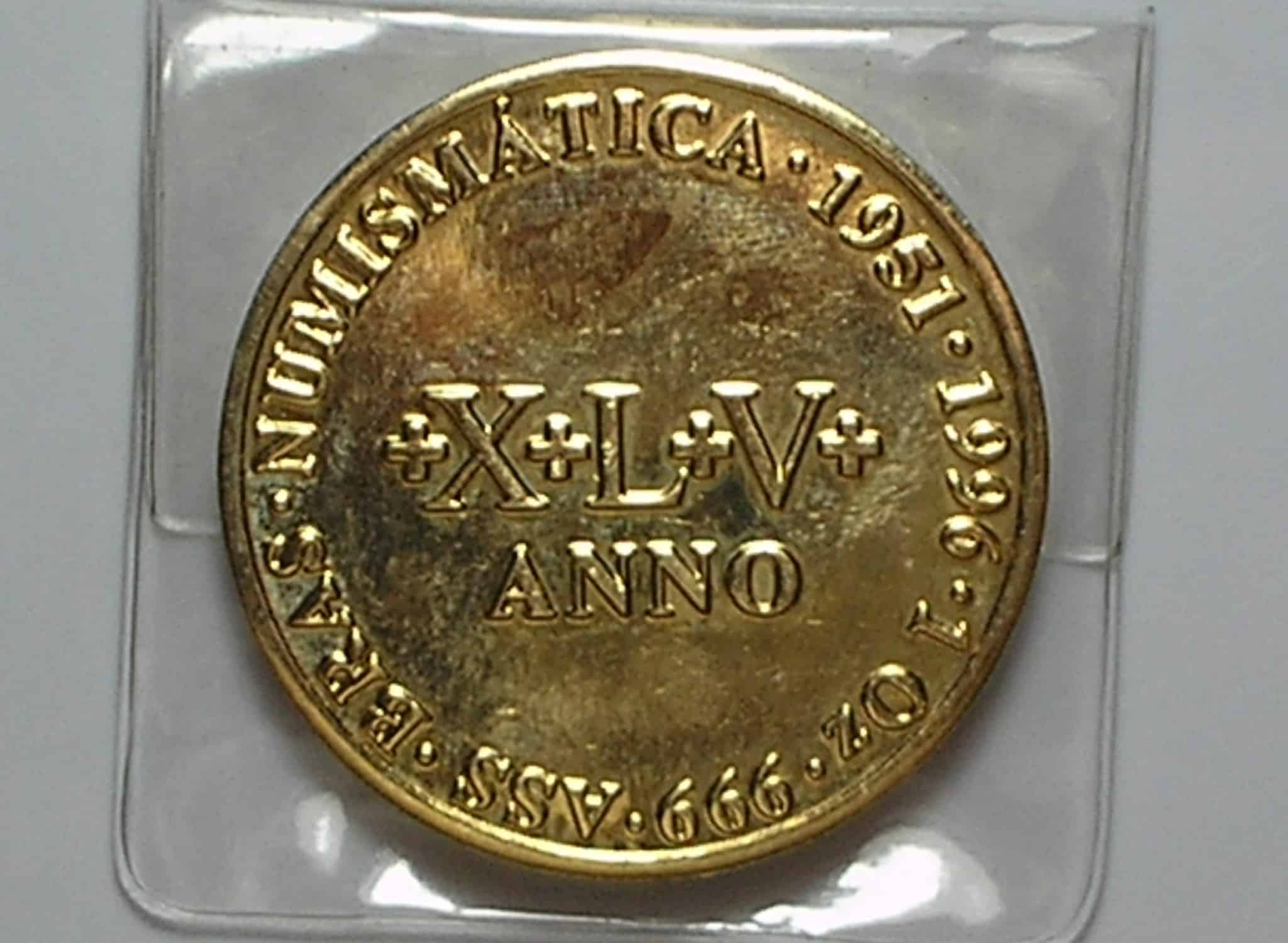 | Casa do Colecionador Medalha Importante de Julius Meili - pai da Numismática, do II Encontro Internacional de Numismática no Rio de Janeiro, no Htl Novo Mundo em 1996, 1 Onça Bronze dourado, Flor de cunho / Exemplar raro