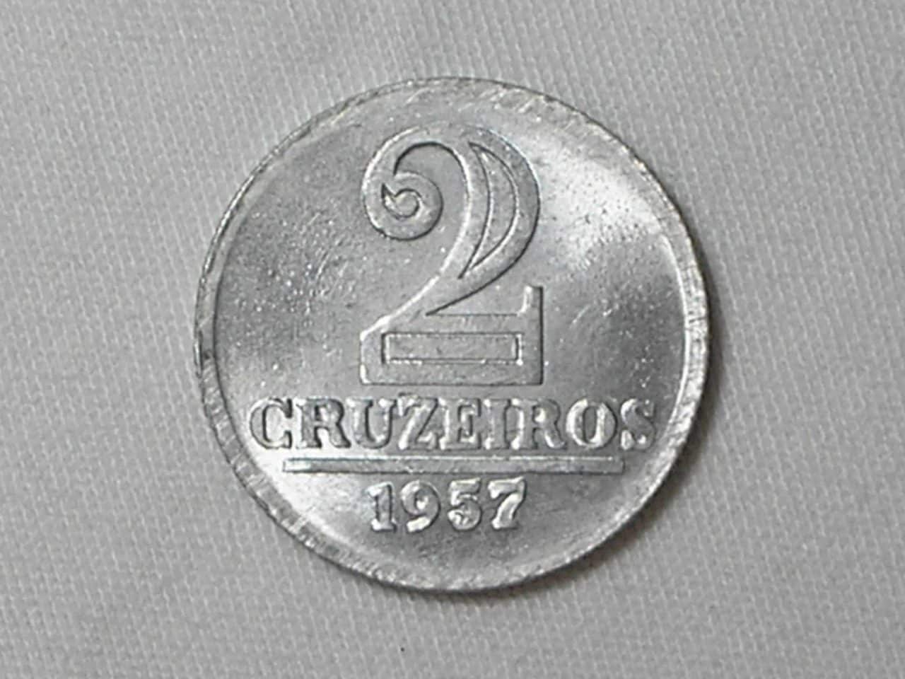 | Casa do Colecionador Escassa moeda de 2 Cruzeiros de 1957 Flor de cunho