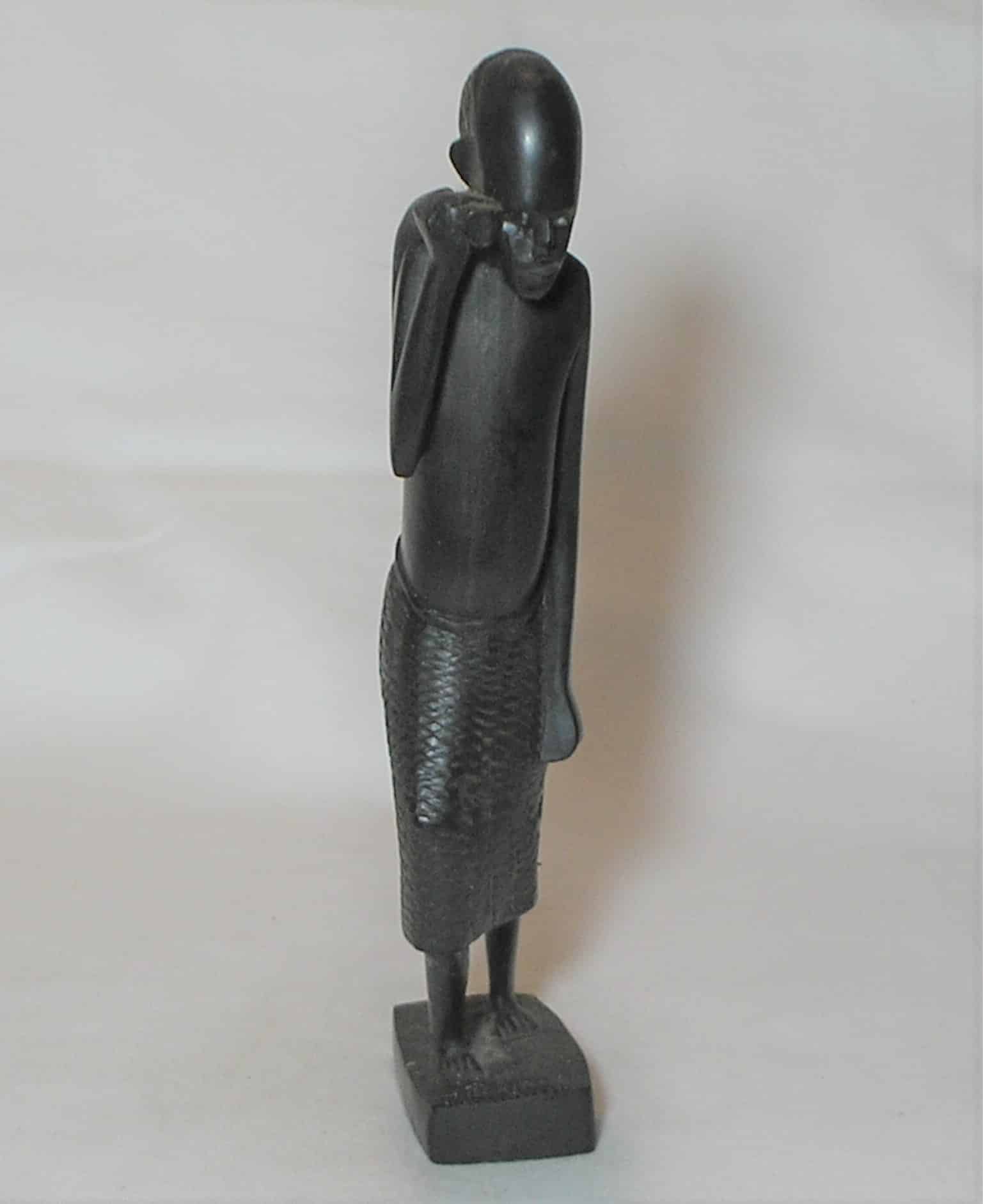 | Casa do Colecionador Escultura esculpida e talhada em madeira no estilo de homem Africano --- Importado