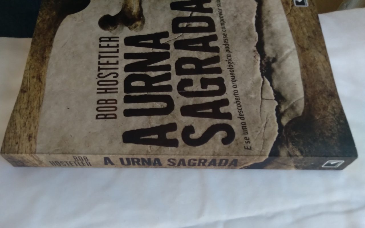 | Casa do Colecionador 23DF Livro A Urna Sagrada. Bob Hostetler. Ed Record.