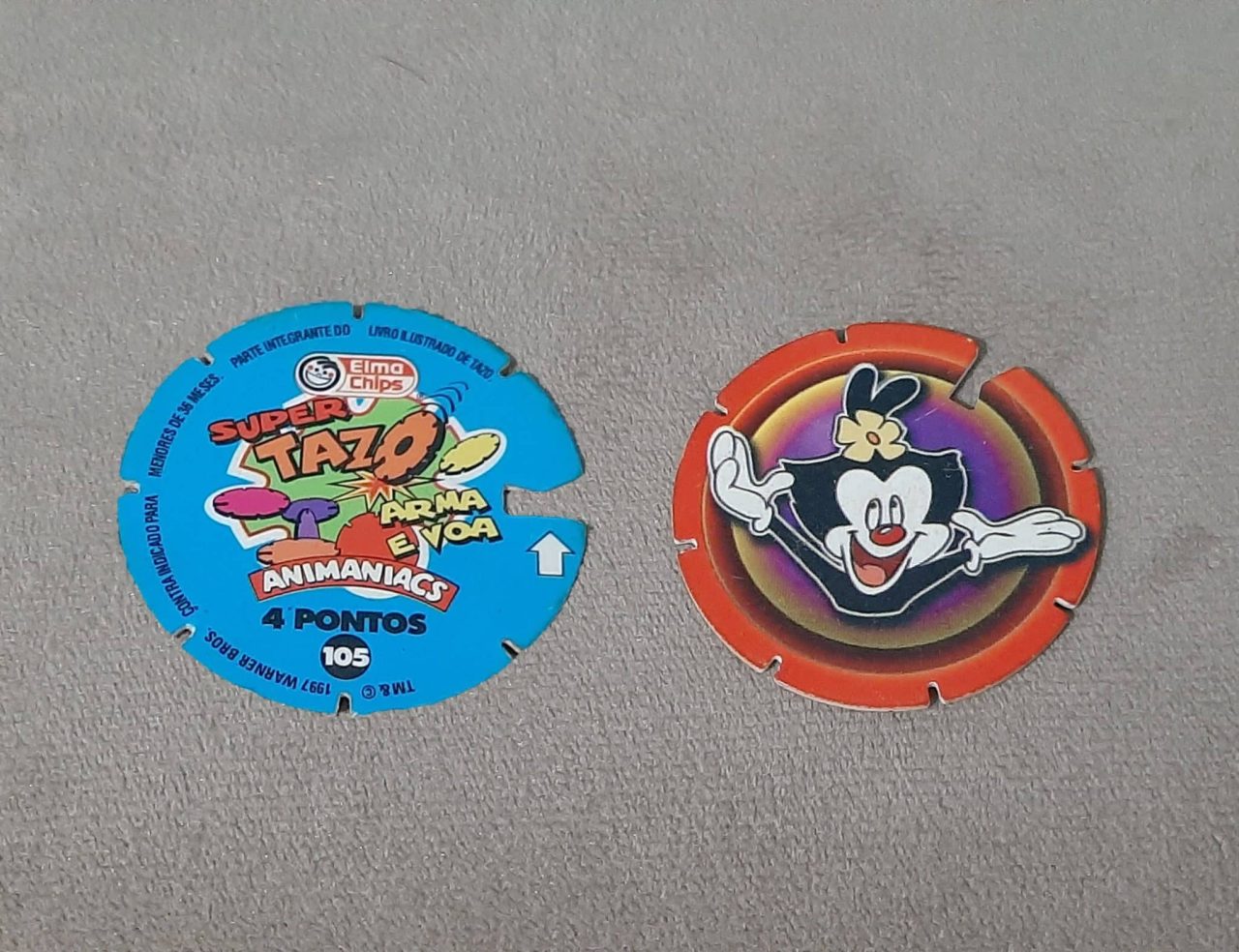 | Casa do Colecionador Mega tazos arma e voa animaniacs N 105