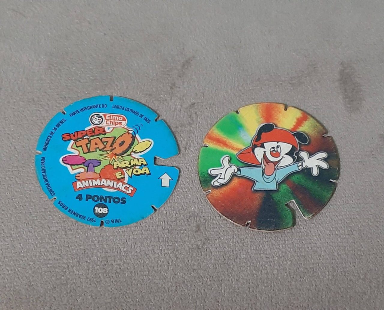| Casa do Colecionador Mega tazos arma e voa animaniacs N 108