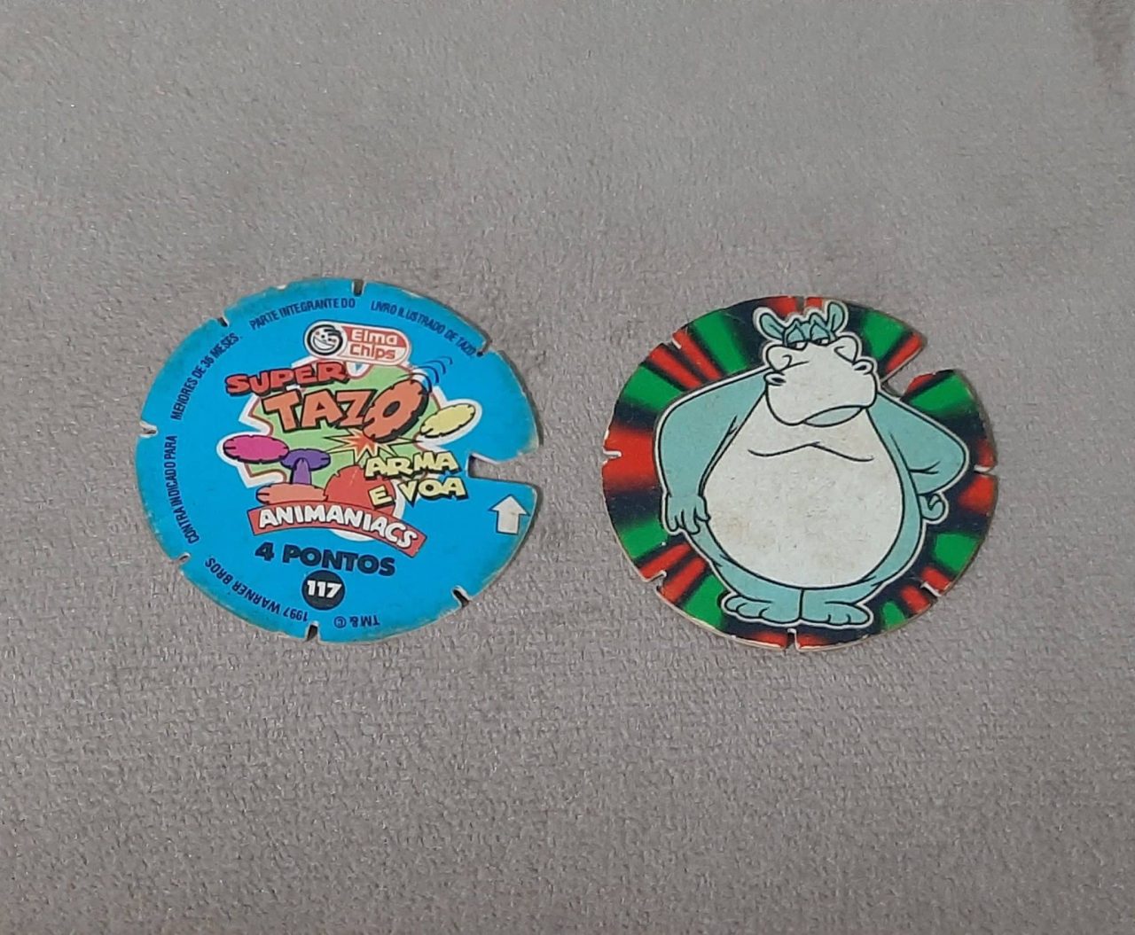 | Casa do Colecionador Mega tazos arma e voa animaniacs N 117