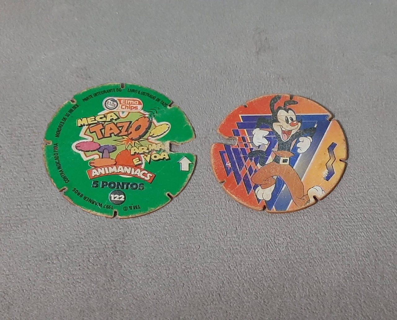| Casa do Colecionador Mega tazos arma e voa animaniacs N 122
