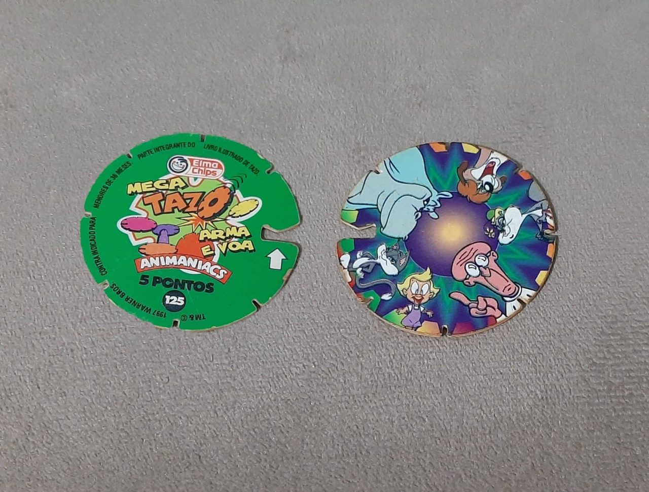 | Casa do Colecionador Mega tazos arma e voa animaniacs N 125