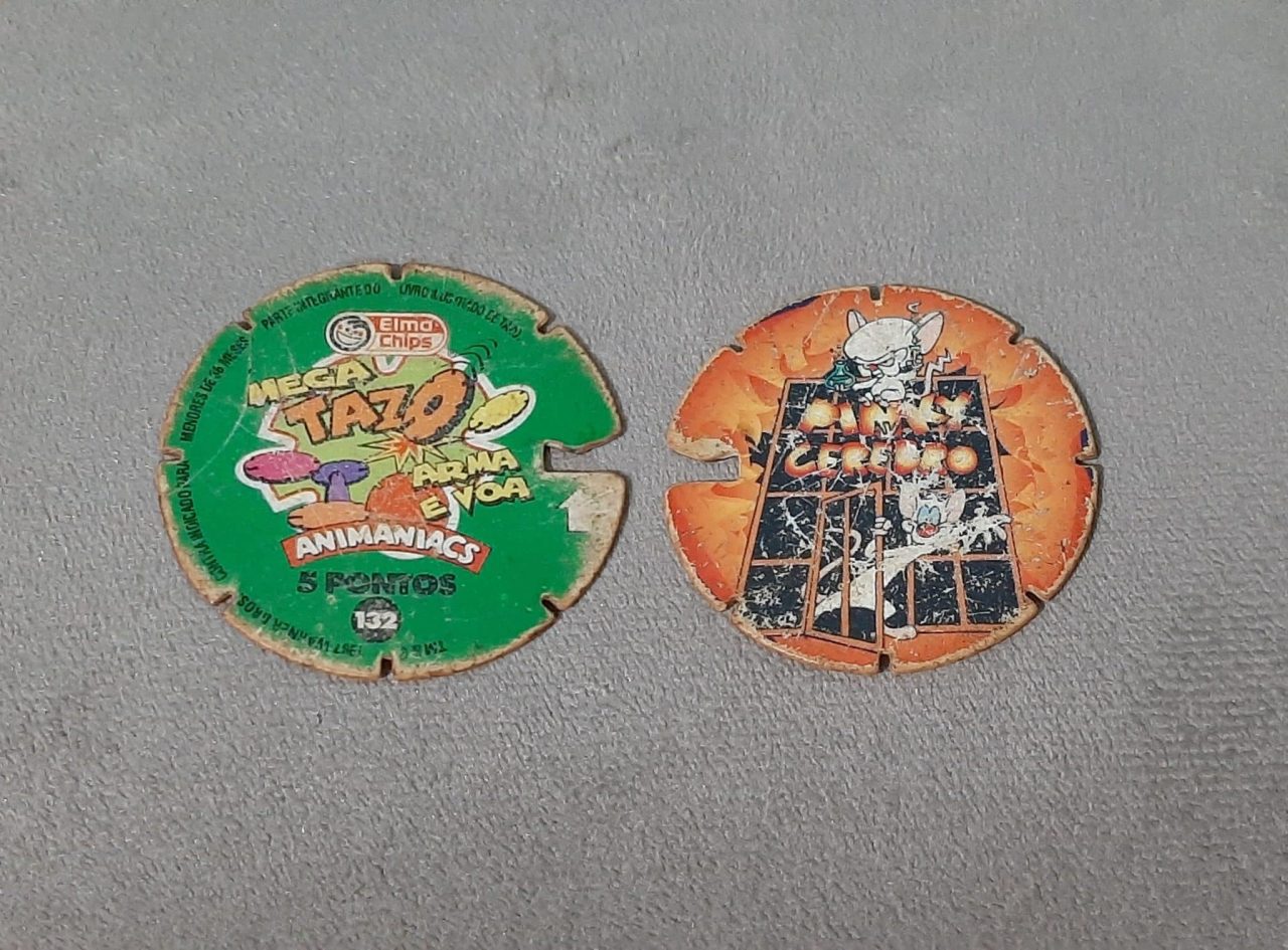 | Casa do Colecionador Mega tazos arma e voa animaniacs N 132