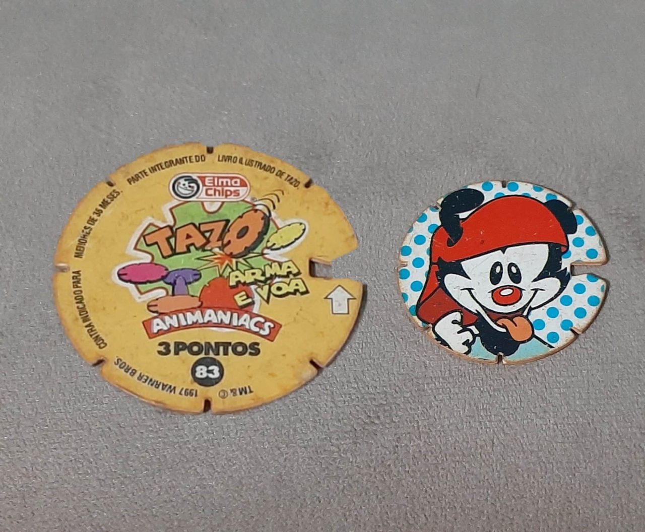 | Casa do Colecionador Mega tazos arma e voa animaniacs N 83