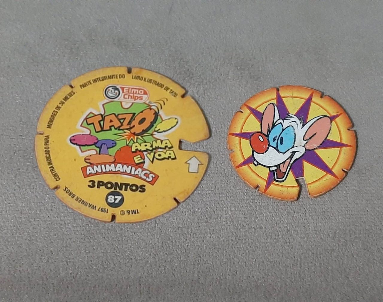 | Casa do Colecionador Mega tazos arma e voa animaniacs N 87