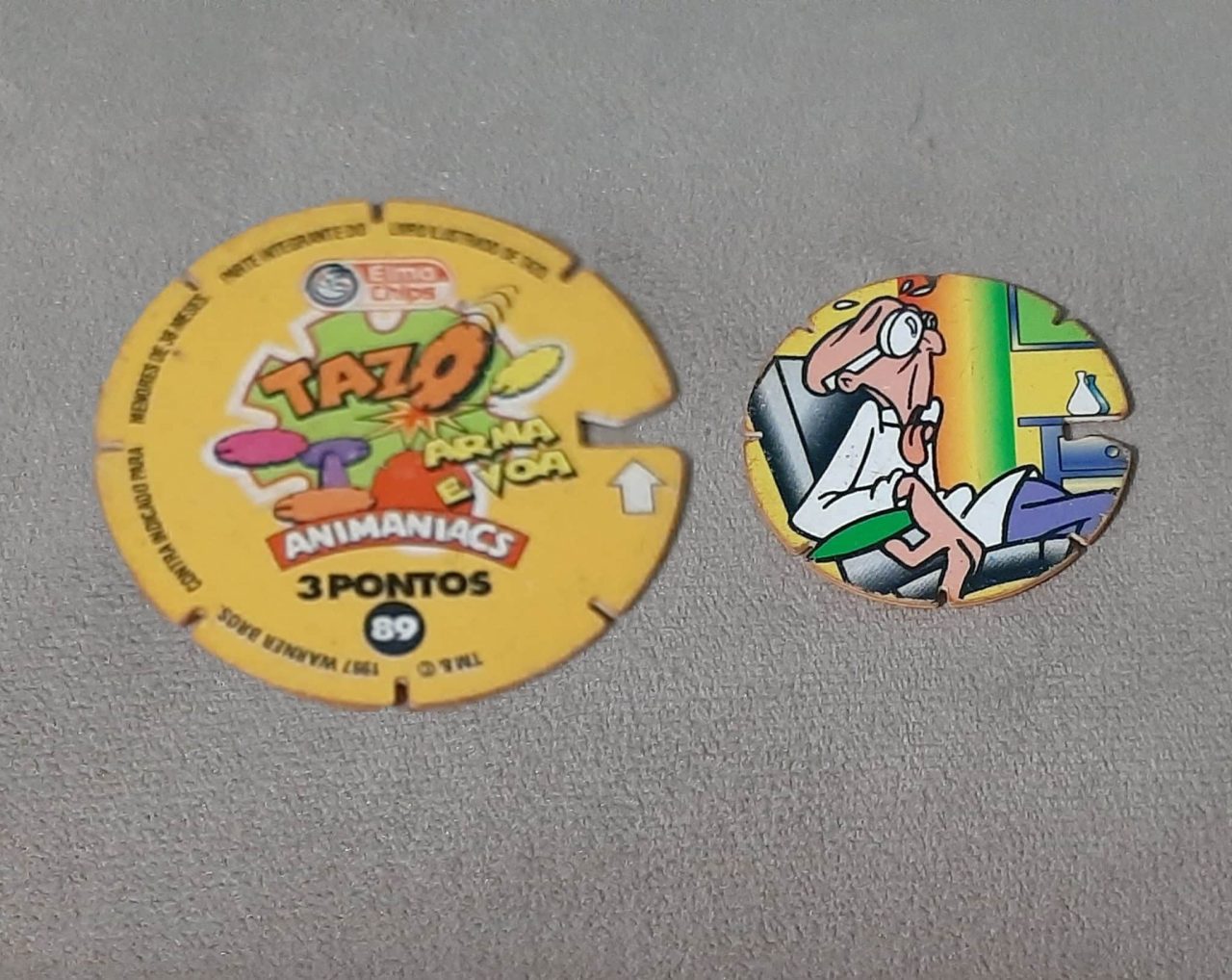 | Casa do Colecionador Mega tazos arma e voa animaniacs N 89