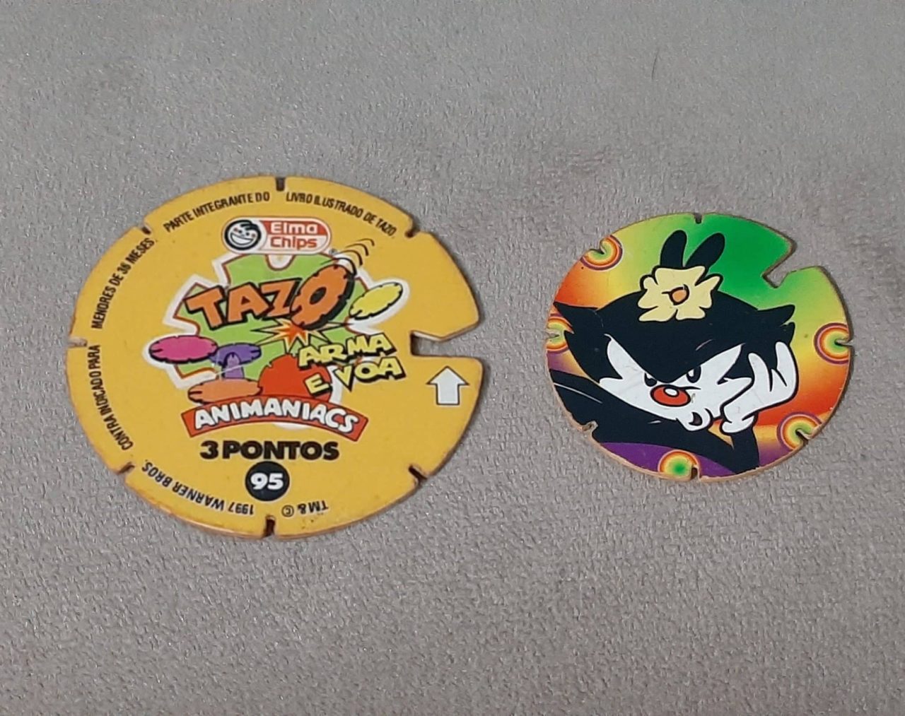 | Casa do Colecionador Mega tazos arma e voa animaniacs N 95