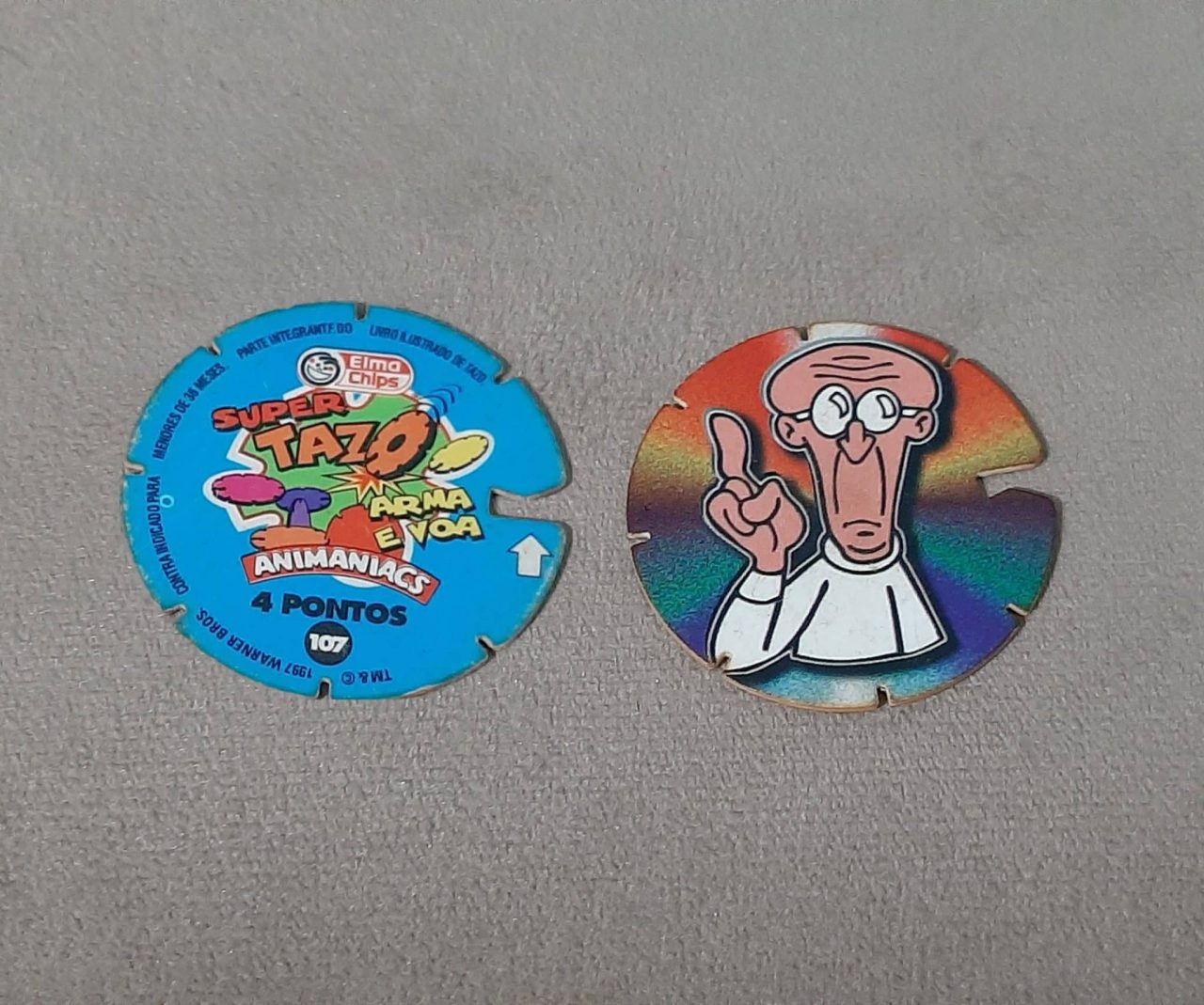 | Casa do Colecionador Mega tazos arma e voa animaniacs N107