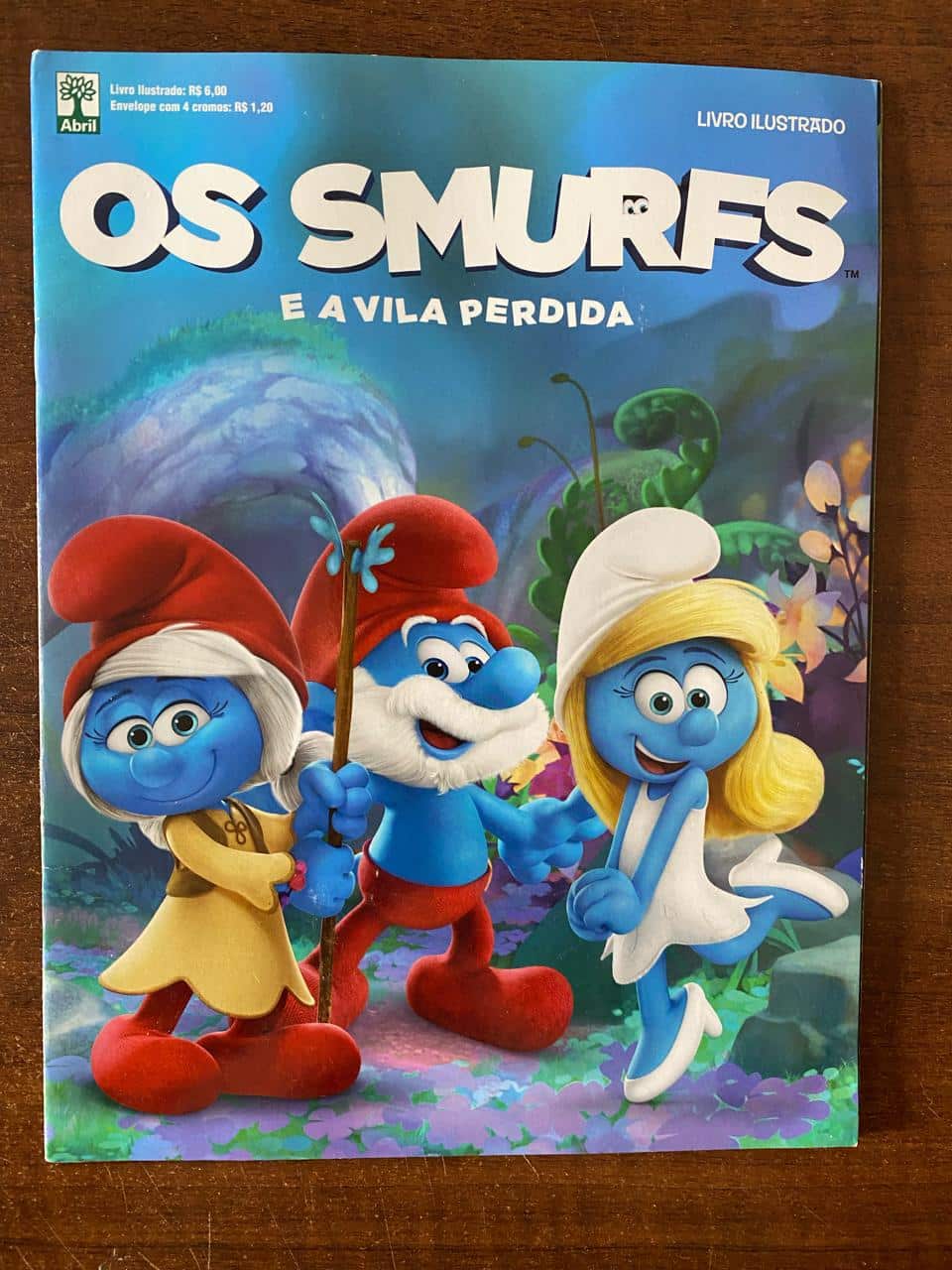 | Casa do Colecionador Álbum Os Smurfs e A Vila Perdida - Editora Abril