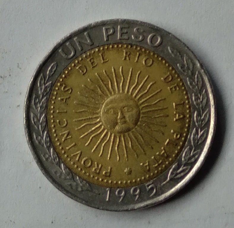 | Casa do Colecionador 24M Moeda Argentina 1995. Bimetálica 1 peso.