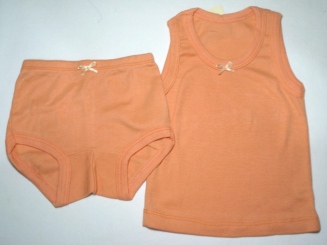 | Casa do Colecionador Conjunto Body com shortinho na cor Rosa em malha com detalhe em lacinho, veste menina de 1 a 3 meses