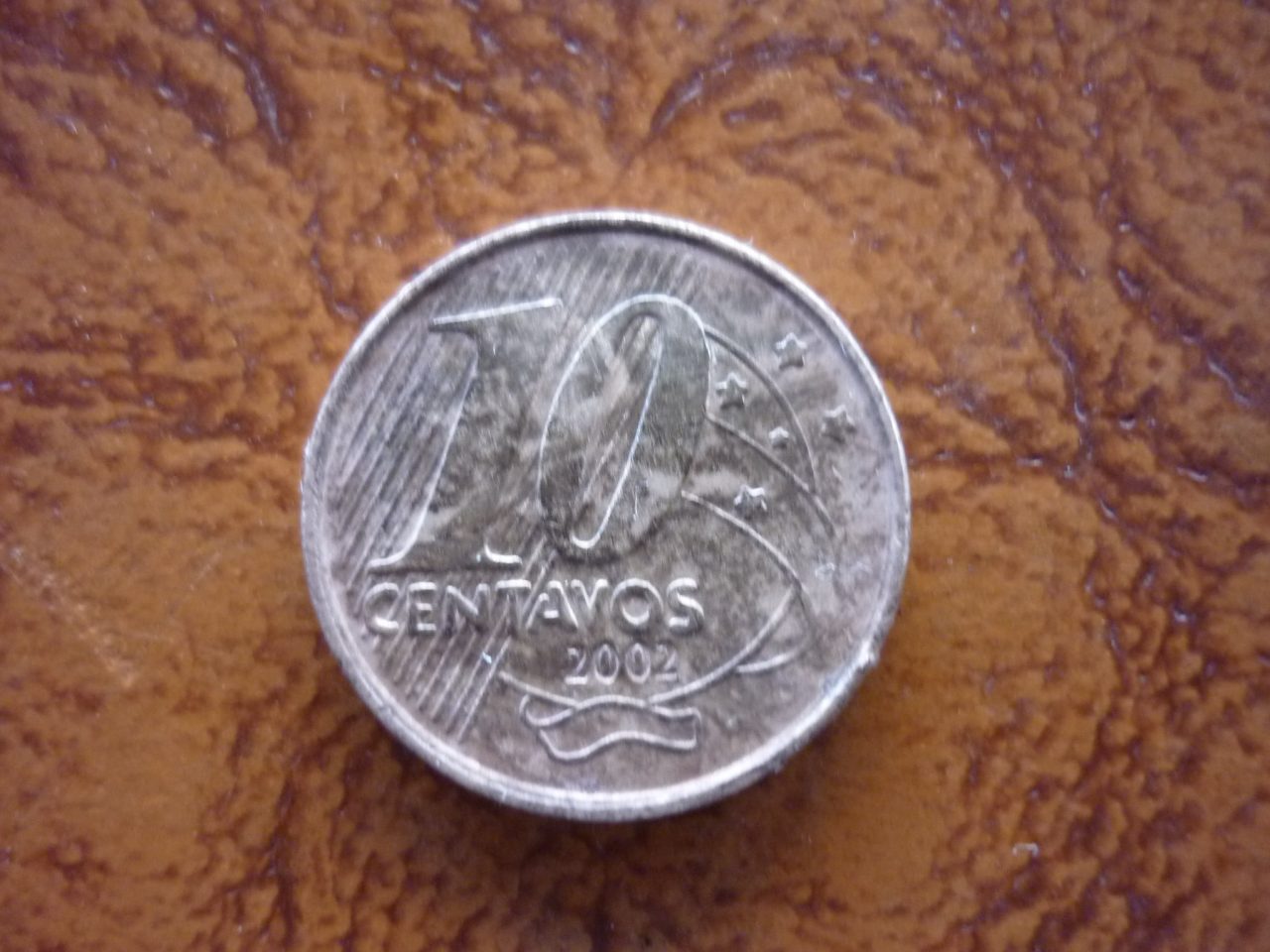 | Casa do Colecionador 10 CENTAVOS REAL 2002 COM SOBRA DE METAL .