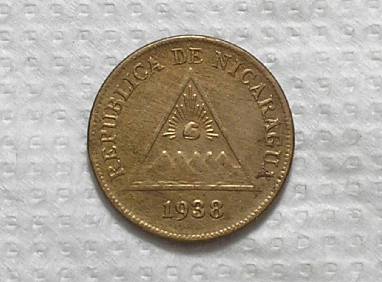 | Casa do Colecionador Nicaragua) 1 Centavo - 1938 / 5g / Co/Ni / S/Fc / box53