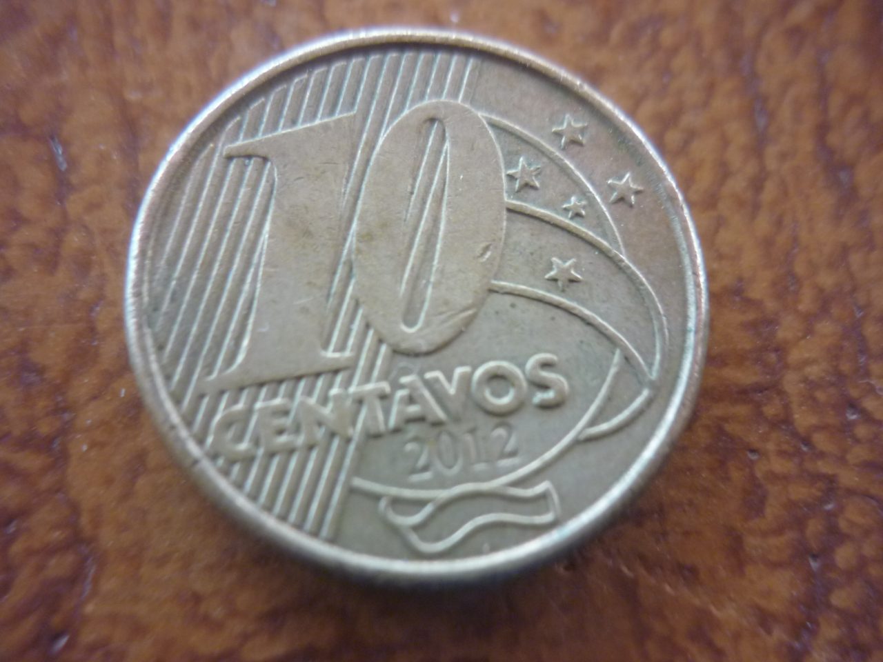 | Casa do Colecionador 10 CENTAVOS REAL 2012 COM SOBRA DE METAL .