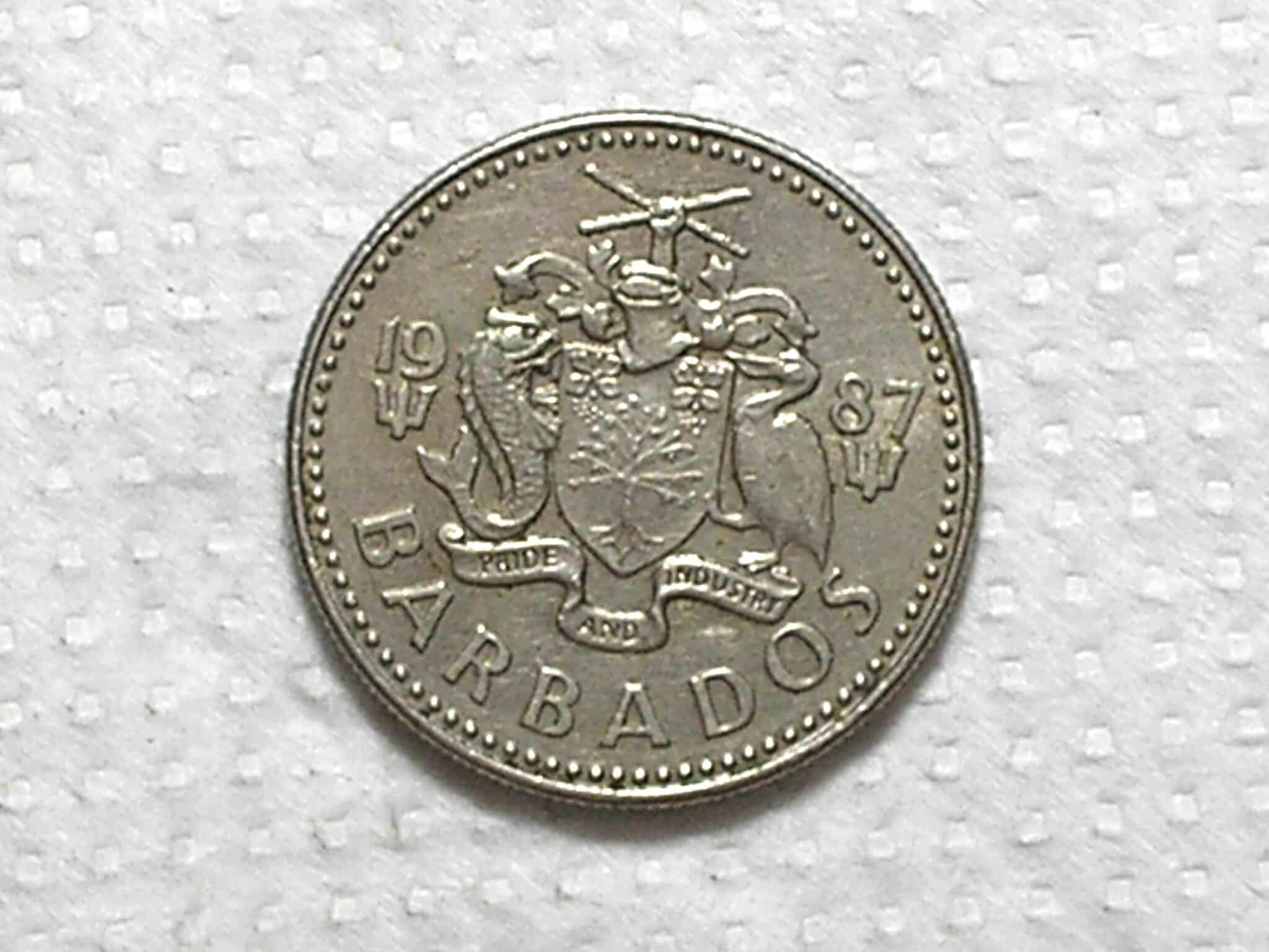 | Casa do Colecionador Barbados) 25 Cents - 1987 / 23,6mm / Co/Ni / box55