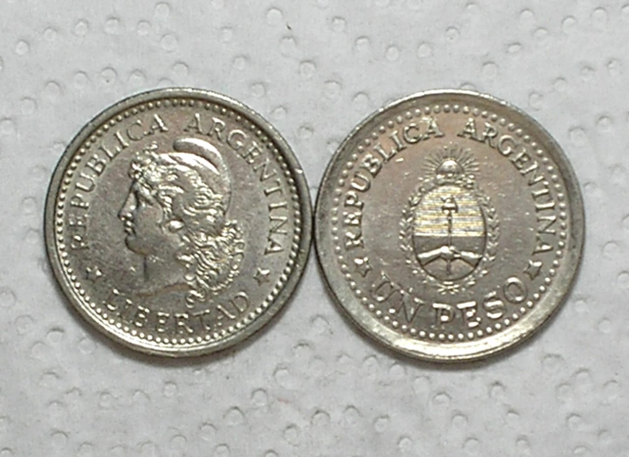 | Casa do Colecionador Argentina) 1 Peso - 1958 /1960- Carimbo Piratini / Ni/St / Sob / box56