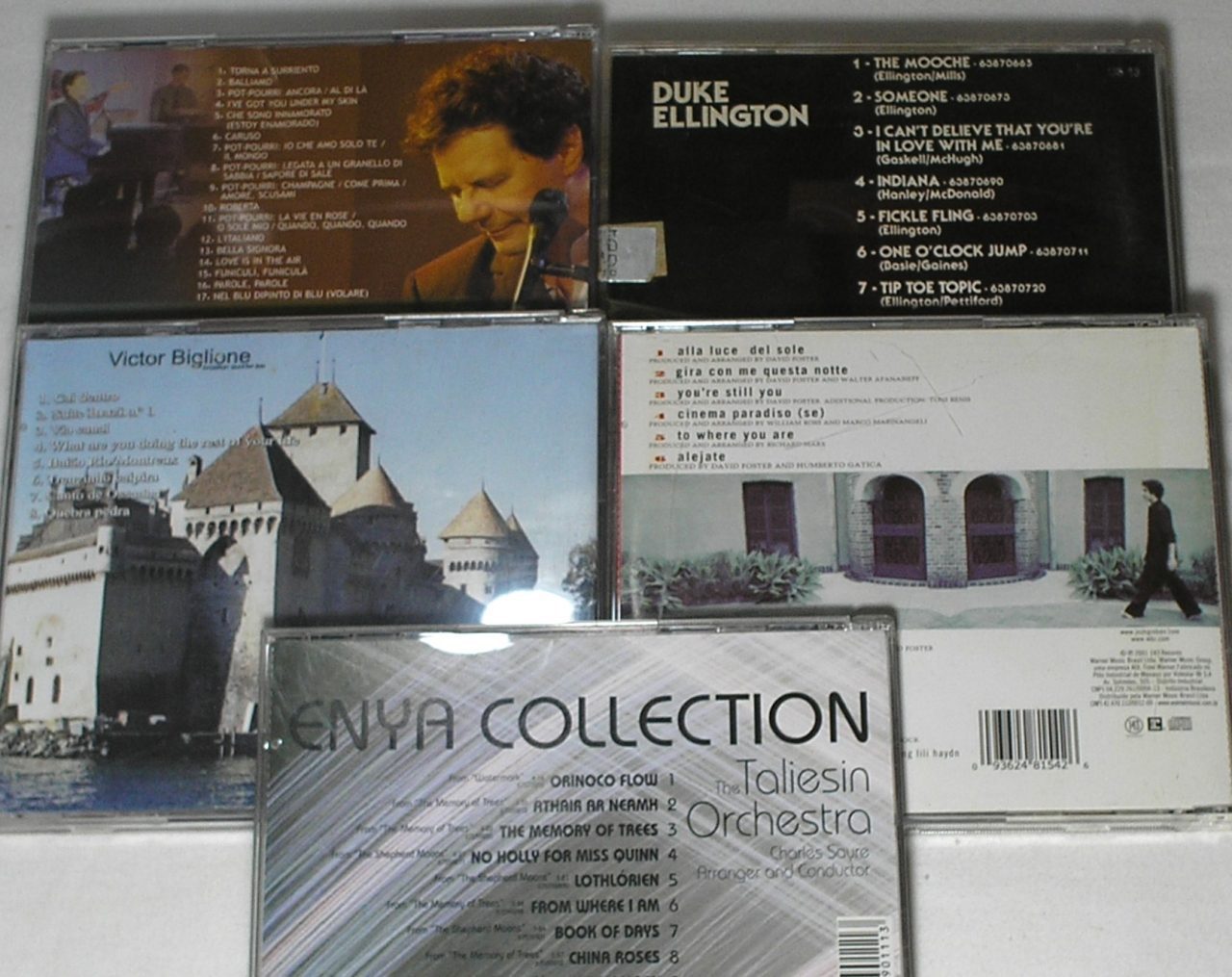 | Casa do Colecionador Cinco CD's antigos da época - Grandes Sucessos da época - Enya Collection / Victor Biglione / Josh Groban / Luciano Bruno / Duke Ellington