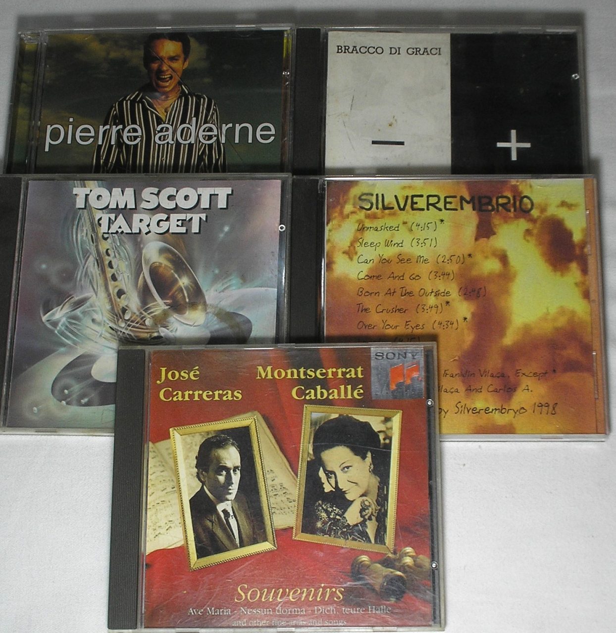 | Casa do Colecionador Cinco CD's antigos da época - Grandes Sucessos da época - Jose Carreras e Montserrat Caballé / Silverembrio / Tom Scott Target / Pierre Aderne / Bracco Di Graci