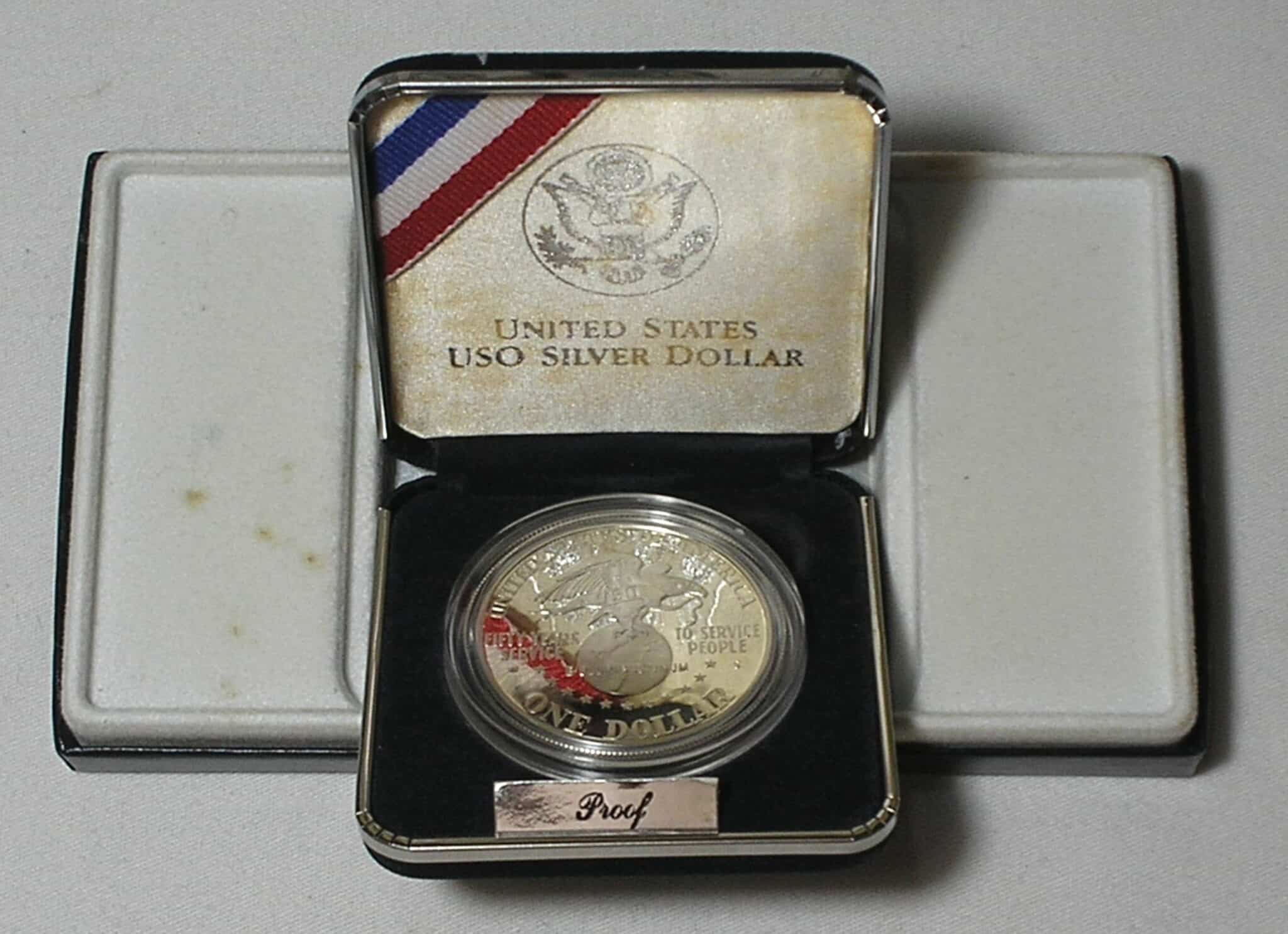 | Casa do Colecionador Usa) Estojo 1 Dollar - 1991-S "Comemorativa aos 50 anos do USO - United Service Organization" / Prata Proof / cod. ems.2